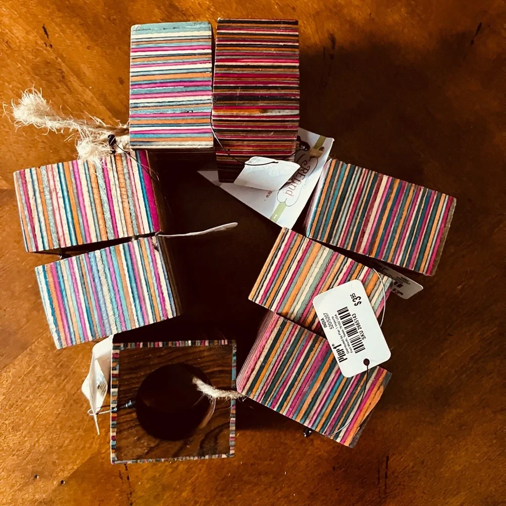 Set of 8 Multicolored Striped Wooden Napkin Rings. Napkin is not included.
